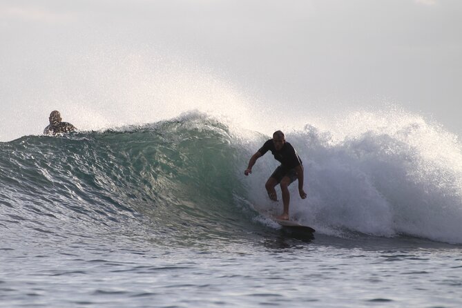 Sunset Surfing Trip to Secluded Beach with Certified Instructors - A private lesson in steady waves