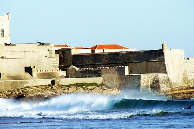 Surf Lesson on Praia de Carcavelos - Taking the board into the Atlantic