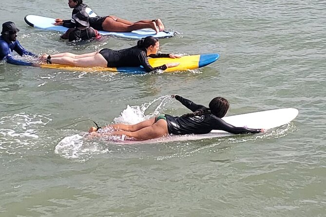 Surf Lessons in Sri lanka Semi - Private or Group Options - The water session: balance, timing, and a helpful push