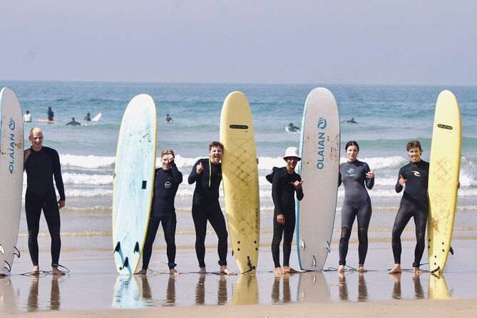 Surf Lessons in Taghazout Ride the Waves with Expert Instructors - Warm-up and stretching before the waves