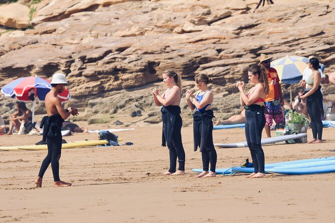 Surf Lessons in Taghazout Ride the Waves with Expert Instructors - Practicing the pop-up on the beach