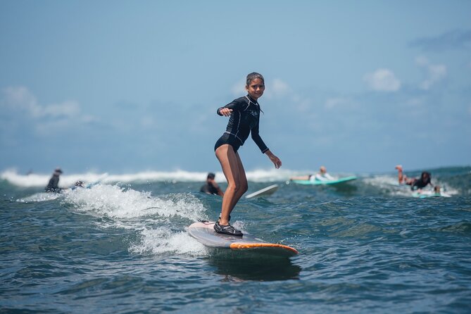 Surf Lessons on the North Shore Great for Families and all Ages - From paddling to standing in the water