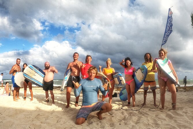 Surfing Lessons - Learn To Surf In Playa del Carmen - Taking the board into small surf