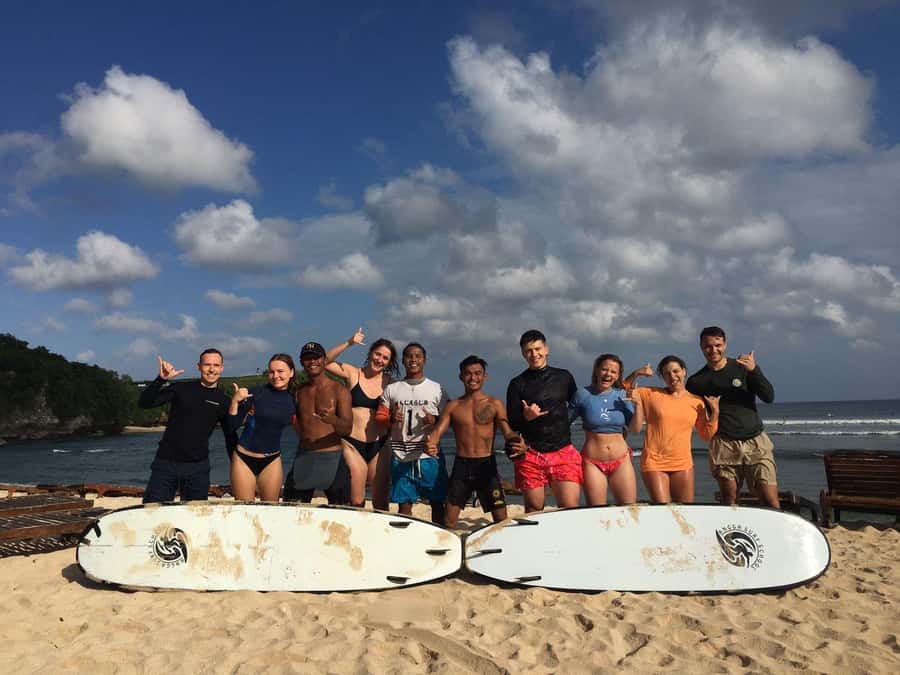 Uluwatu: Private Surf Lesson with Surf Photos & Videos - Learning to catch waves with a small group